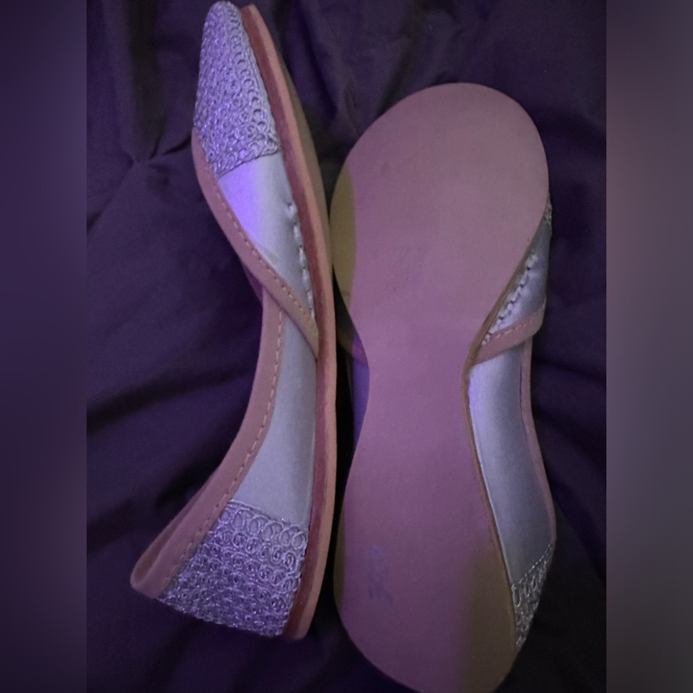 Fuchsia silver flats measures as a size 8